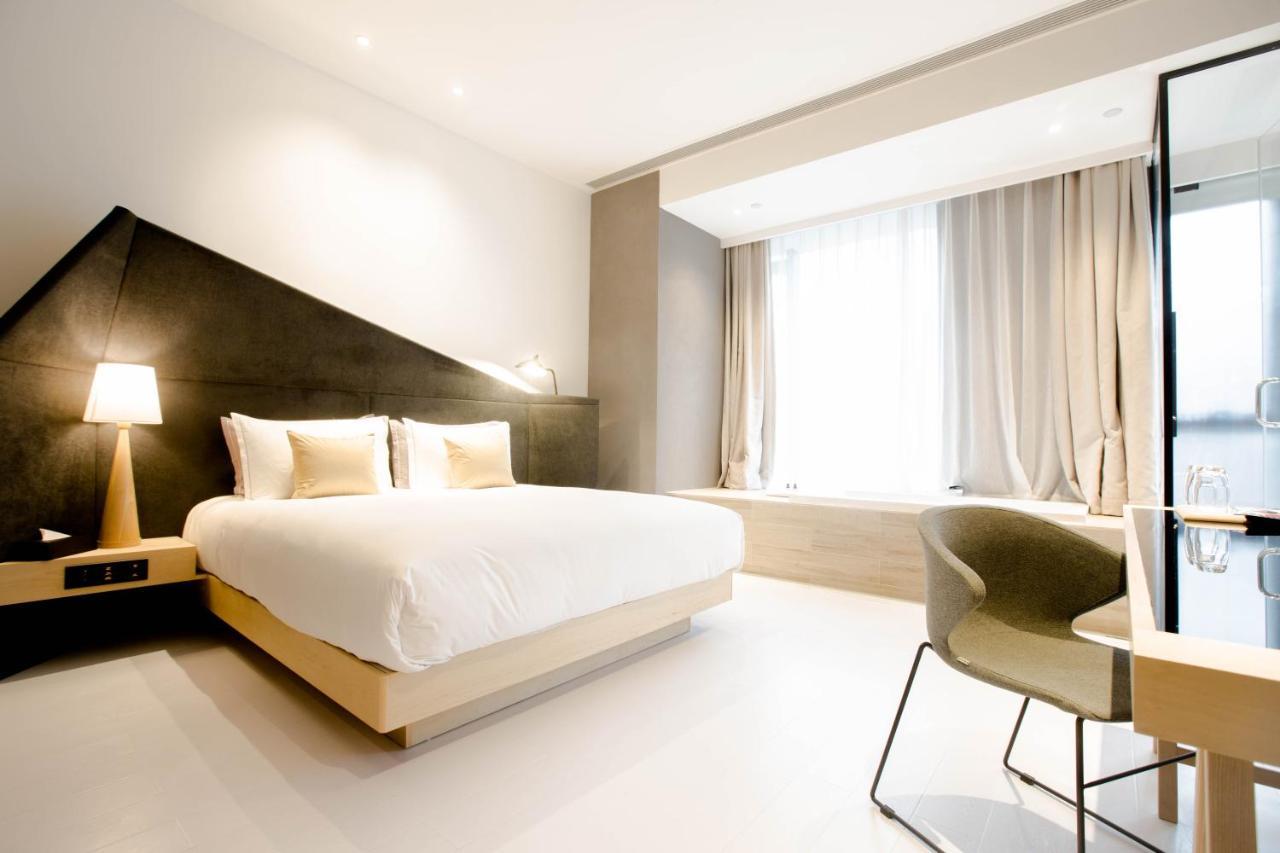 Wheat Hotel Ningbo Bagian luar foto
