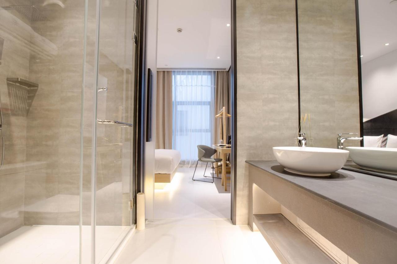 Wheat Hotel Ningbo Bagian luar foto