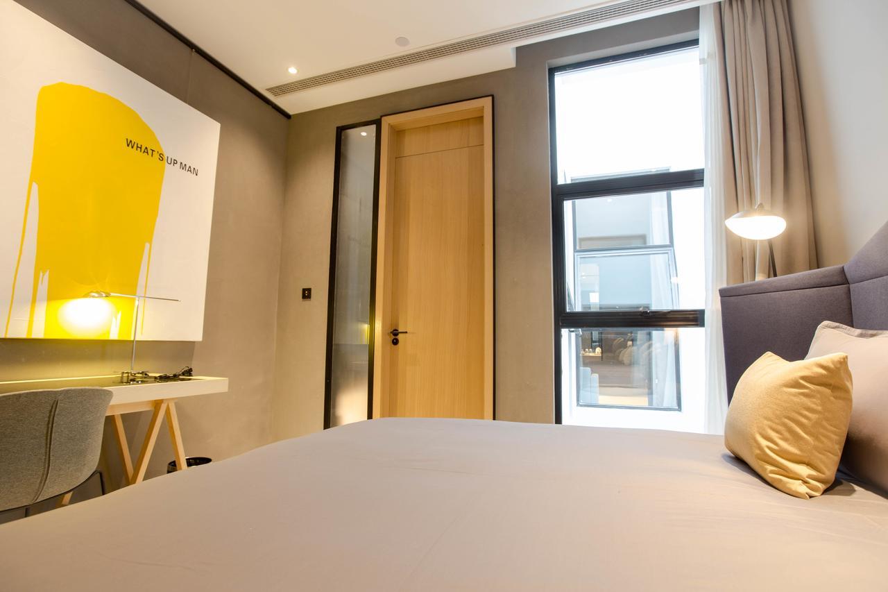 Wheat Hotel Ningbo Bagian luar foto