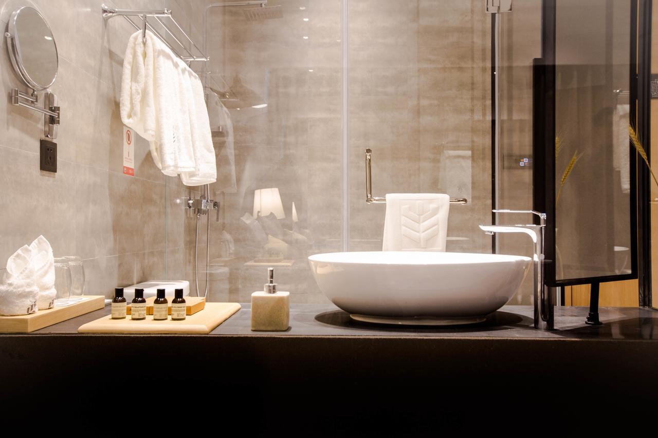 Wheat Hotel Ningbo Bagian luar foto