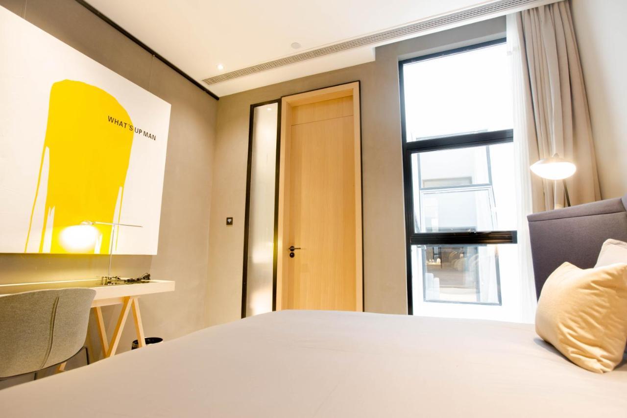 Wheat Hotel Ningbo Bagian luar foto
